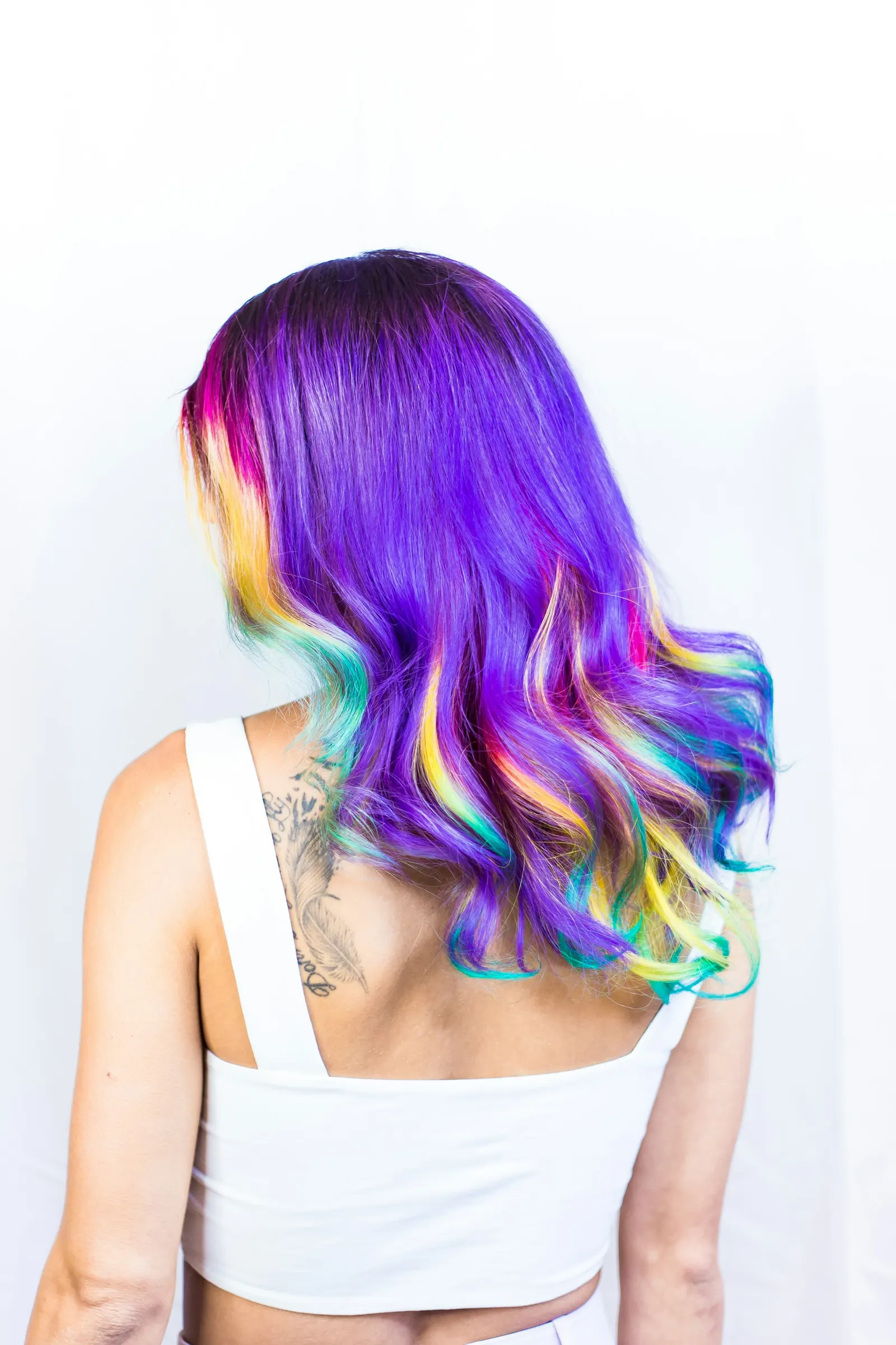 Vivid purple and rainbow hair color