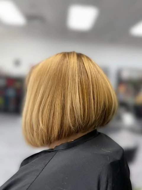 Blonde bob haircut, done at Artistic Trendz