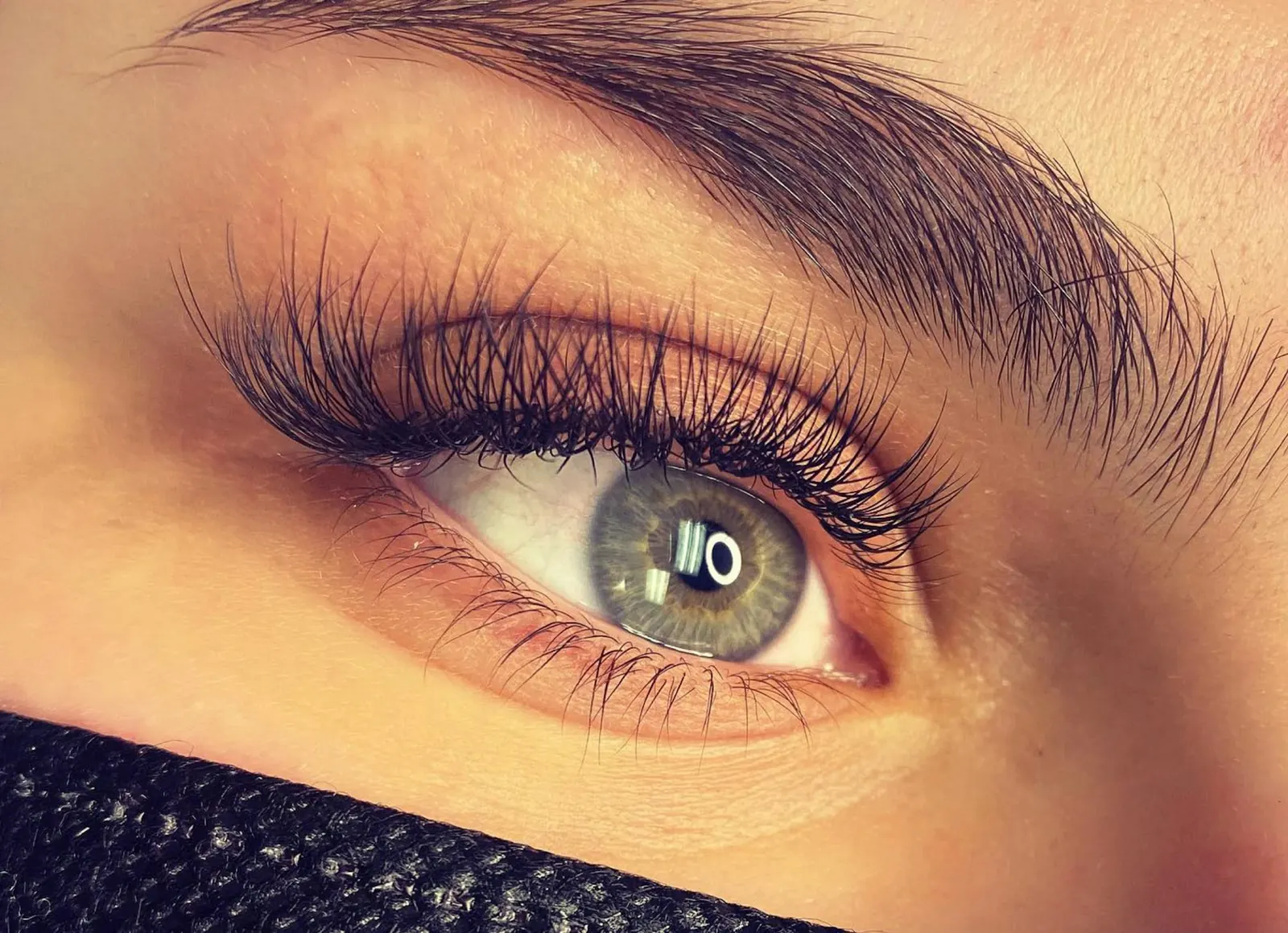 Close-up of full, long lash extensions